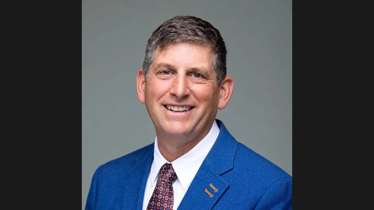 Scugog mayor-elect Ian McDougall, smiling in a blue blazer in his candidate portrait.