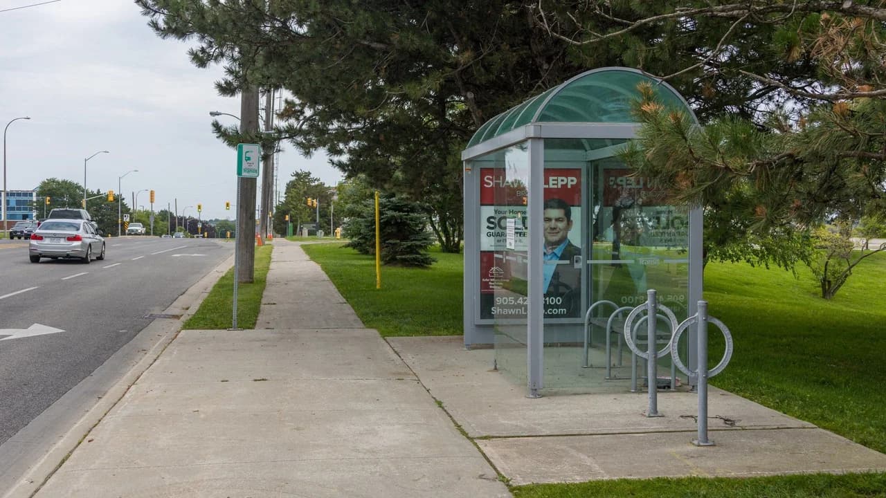A Durham Region Transit bus stop sign on Rossland Road in Whitby, Ontario.