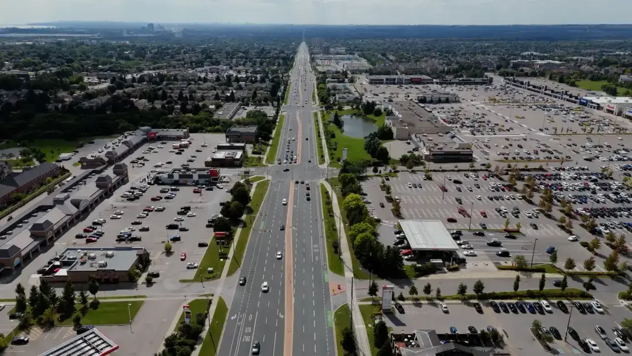 Aerial view of Kingston Road in Ajax with commercial plazas, parking lots and cars; no people or faces discernible. File photo, not the Middlecote Drive and Taunton Road East location.